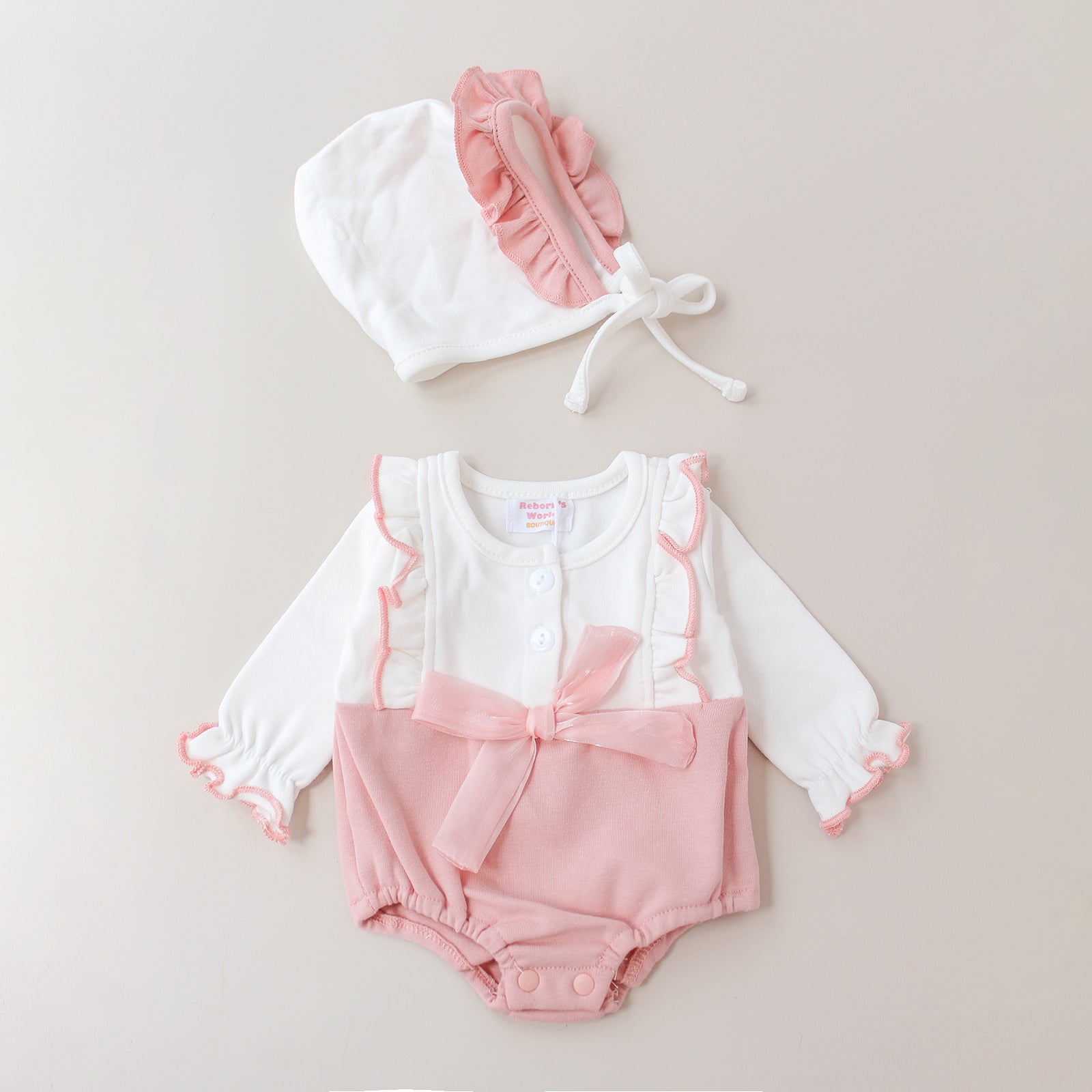 Piel con cordones y capucha ceremonial rosa – Para bebés reborn de 44 a 52 cm