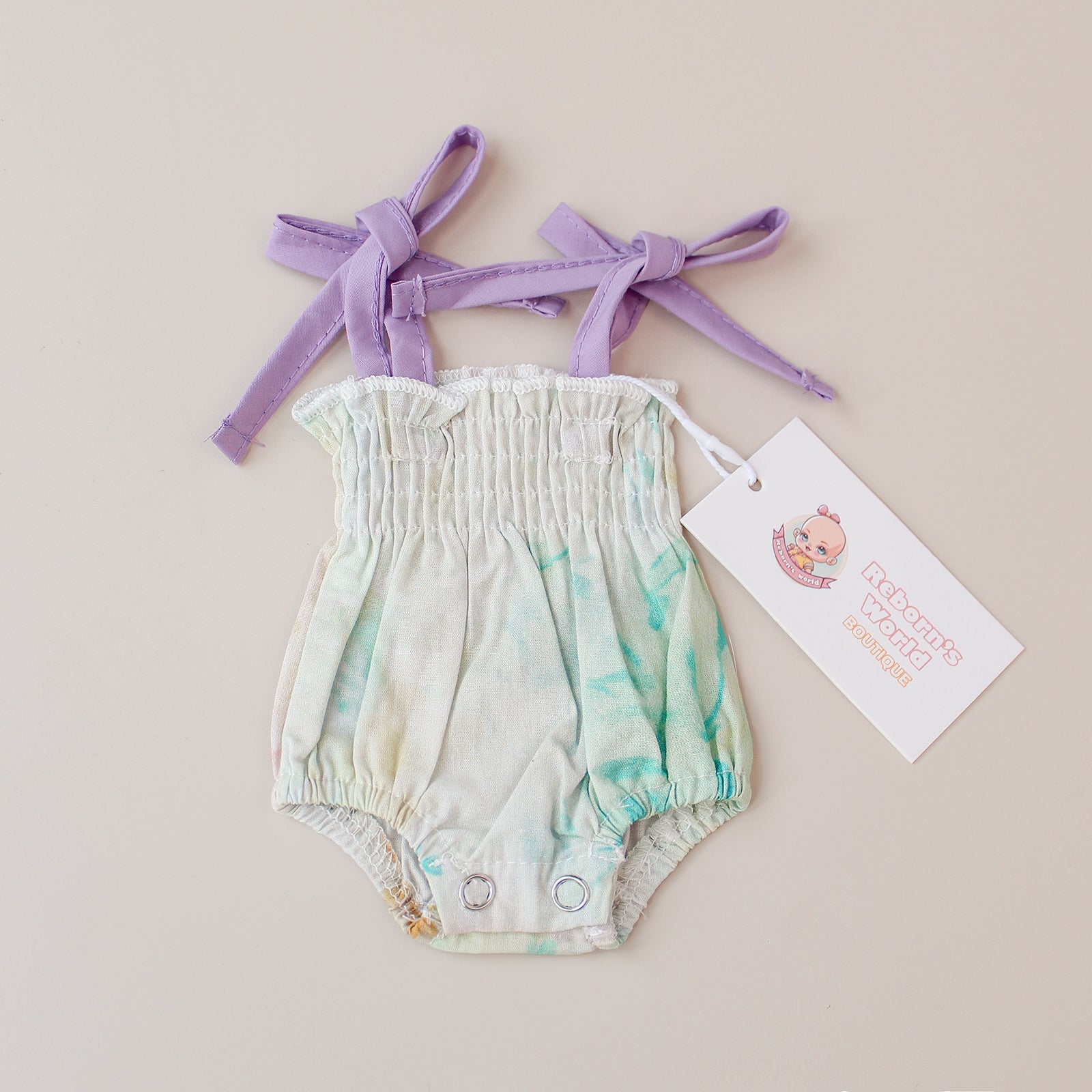 Ranita con estampado floral sobre tiras de colores – Para bebés reborn de 33 a 40 cm