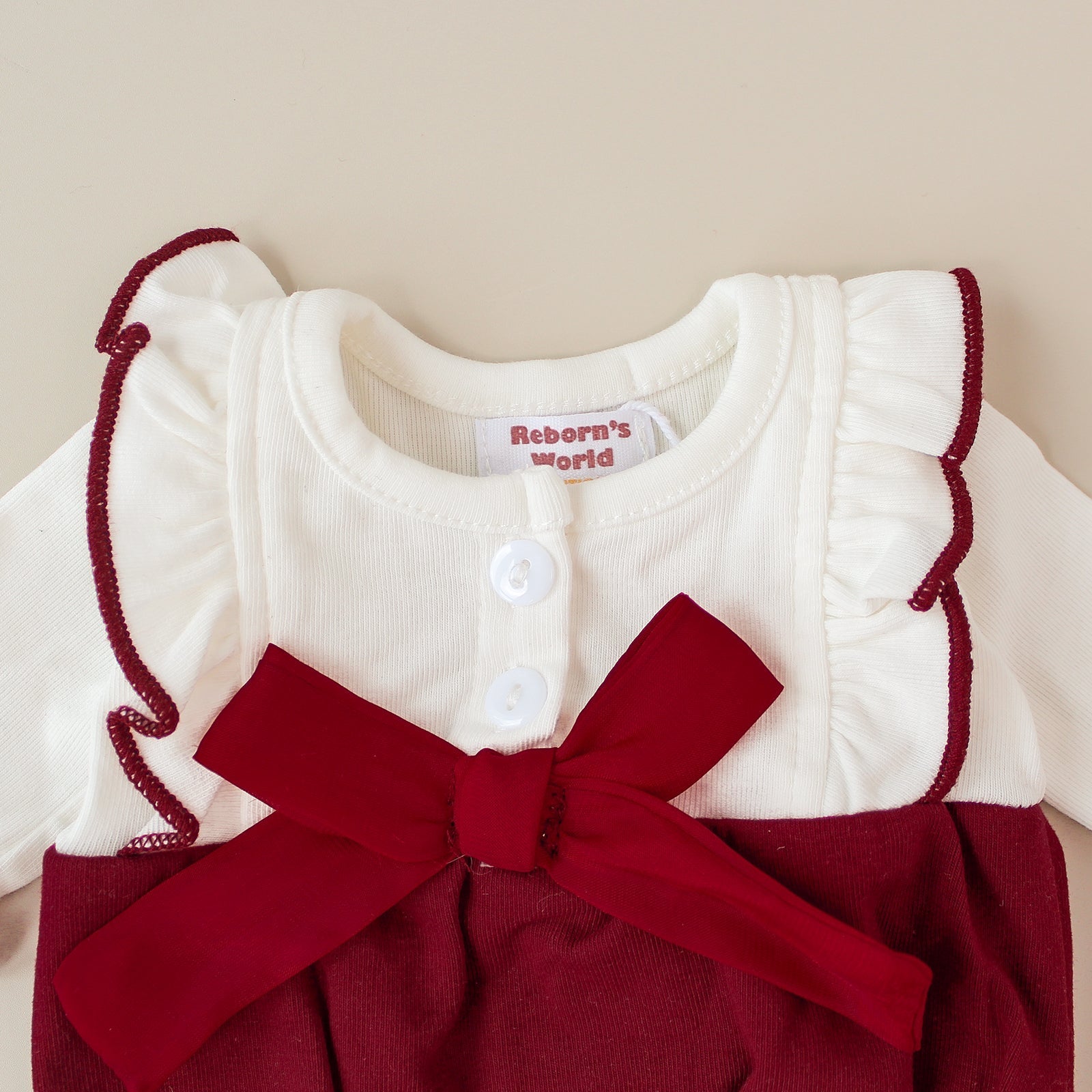 Piel con cuero ceremonial y capucha color burdeos – Para bebés reborn de 40 a 48 cm